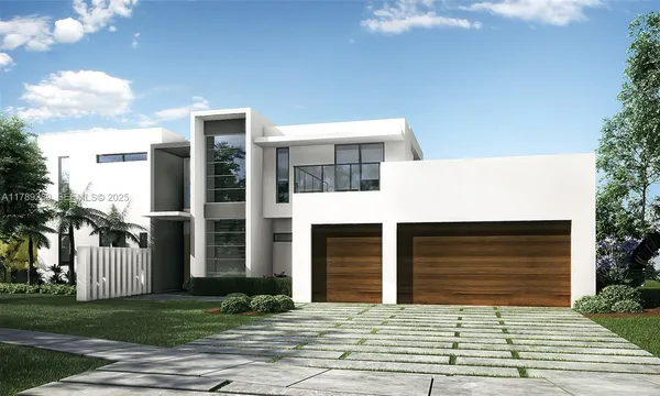 a front view of a building with a yard