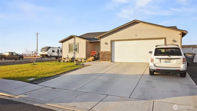 a big house with a big yard and more windows