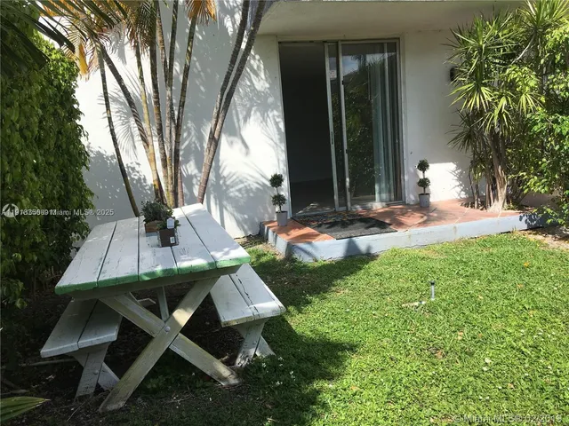 swimming pool view with seating space