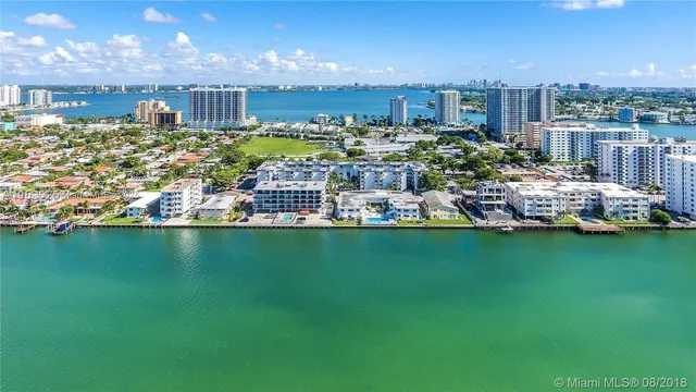 a view of a city with lots of trees and houses