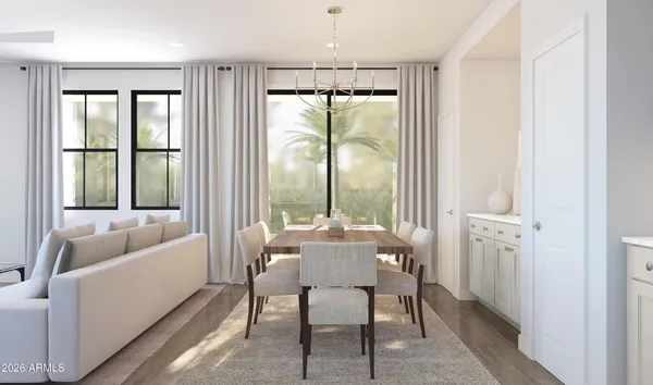 a view of a dining room with furniture window and outside view