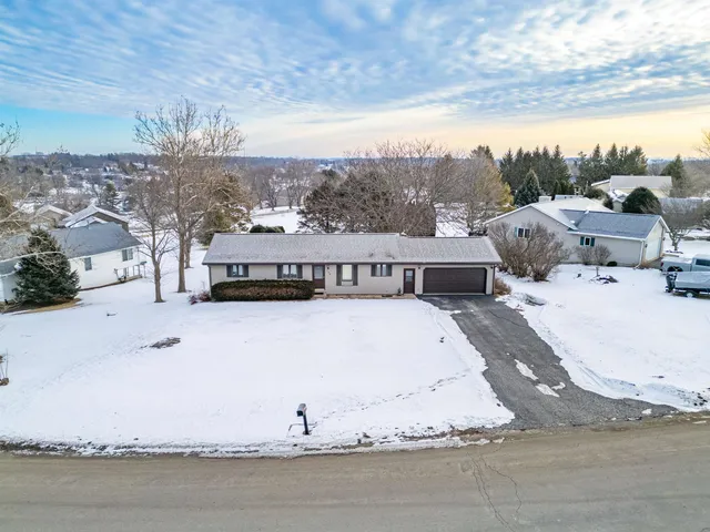 a view of a house with a snow