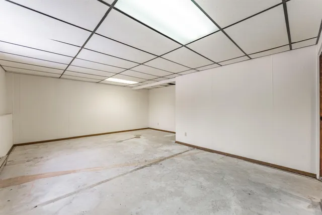 a view of a garage with a table and chairs