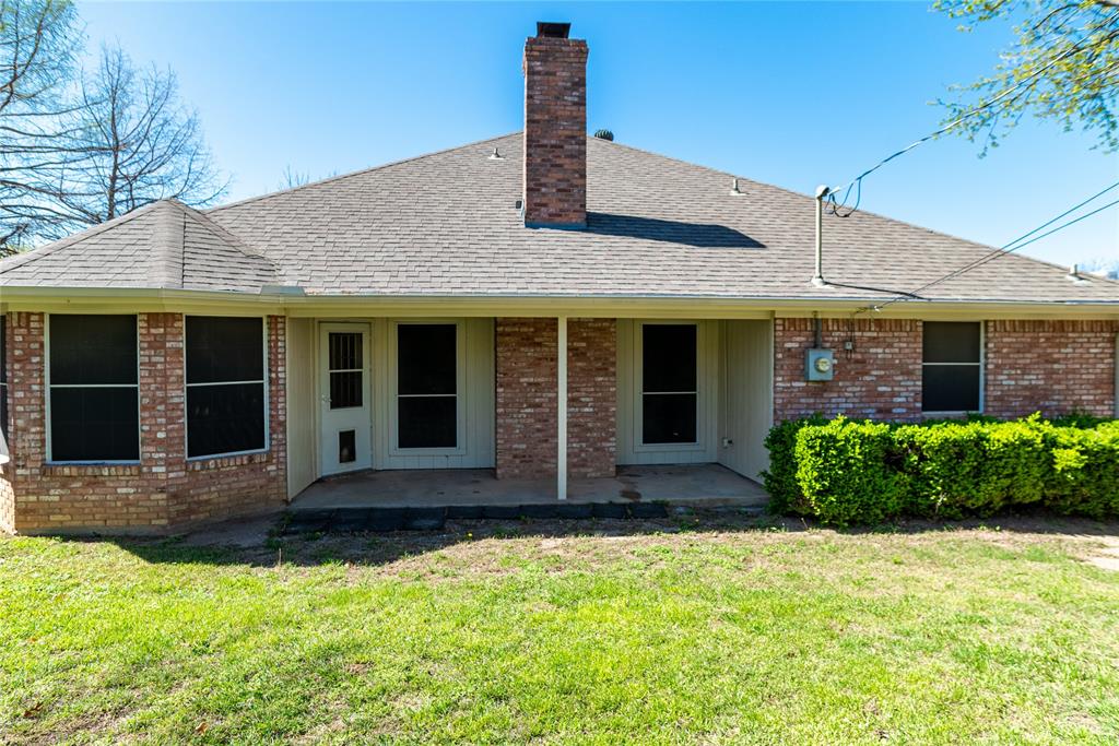 604 Valleyridge Court Decatur, TX 76234 - Photo 23 of 23 Huge Backyard with Covered Patio
