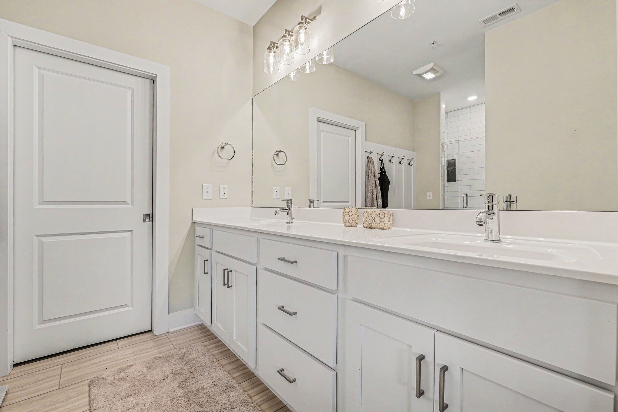 1144 Lock 4 Road, Unit H3 Gallatin, TN 37066 - Photo 17 of 22 a bathroom with double sink and a mirror