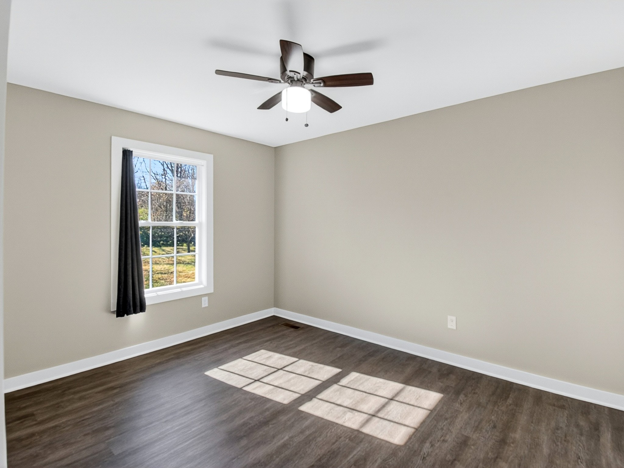 621 Womack Road Bethpage, TN 37022 - Photo 27 of 50 wooden floor in an empty room with a window