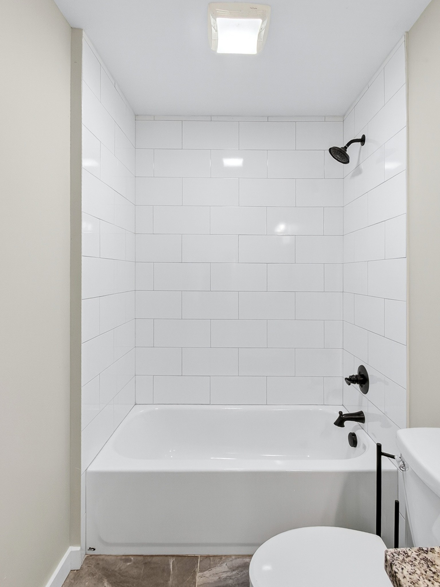 621 Womack Road Bethpage, TN 37022 - Photo 33 of 50 a bathroom with a bathtub and a toilet