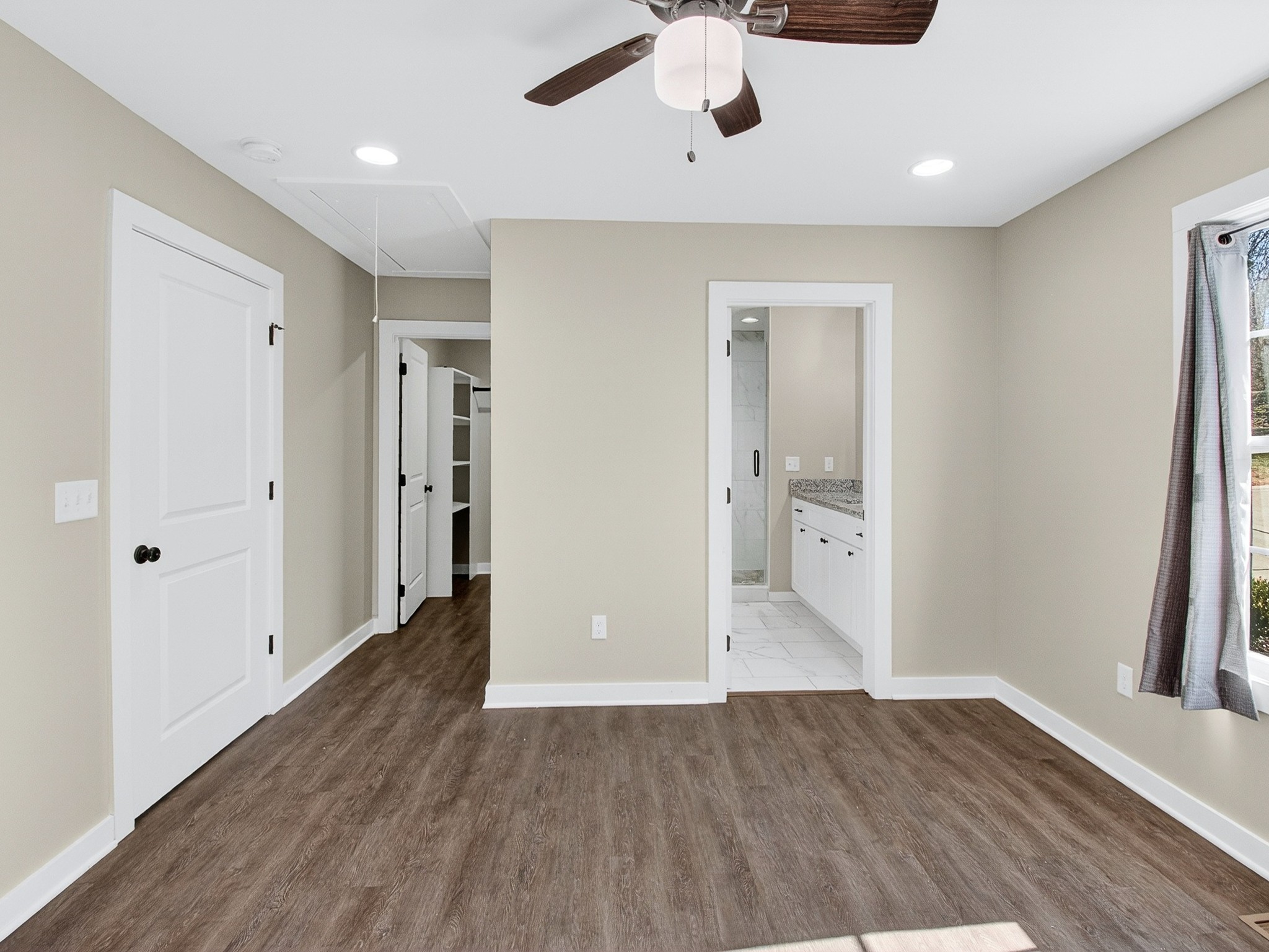 621 Womack Road Bethpage, TN 37022 - Photo 36 of 50 an empty room with wooden floor and entryway