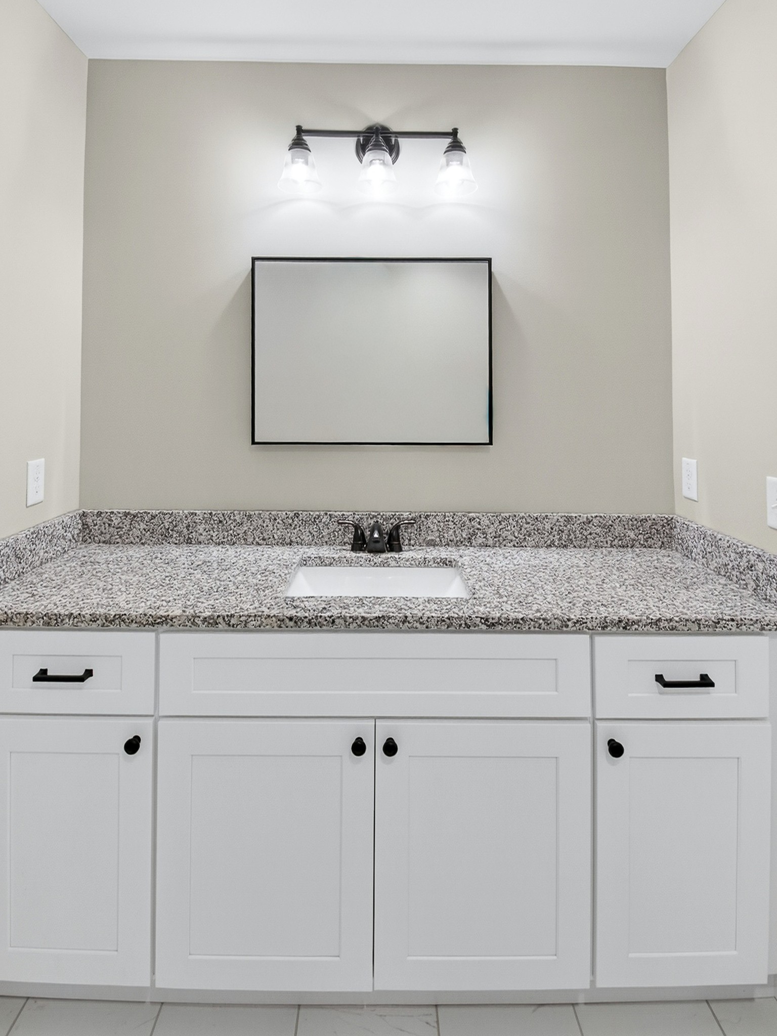 621 Womack Road Bethpage, TN 37022 - Photo 41 of 50 a bathroom with white cabinets and sink