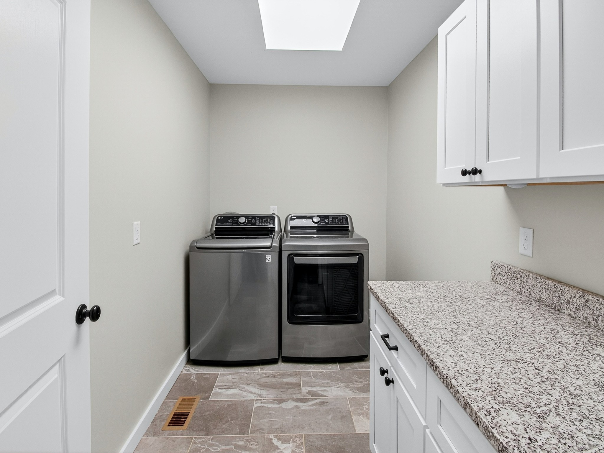 621 Womack Road Bethpage, TN 37022 - Photo 43 of 50 a kitchen with granite countertop a sink and a stove