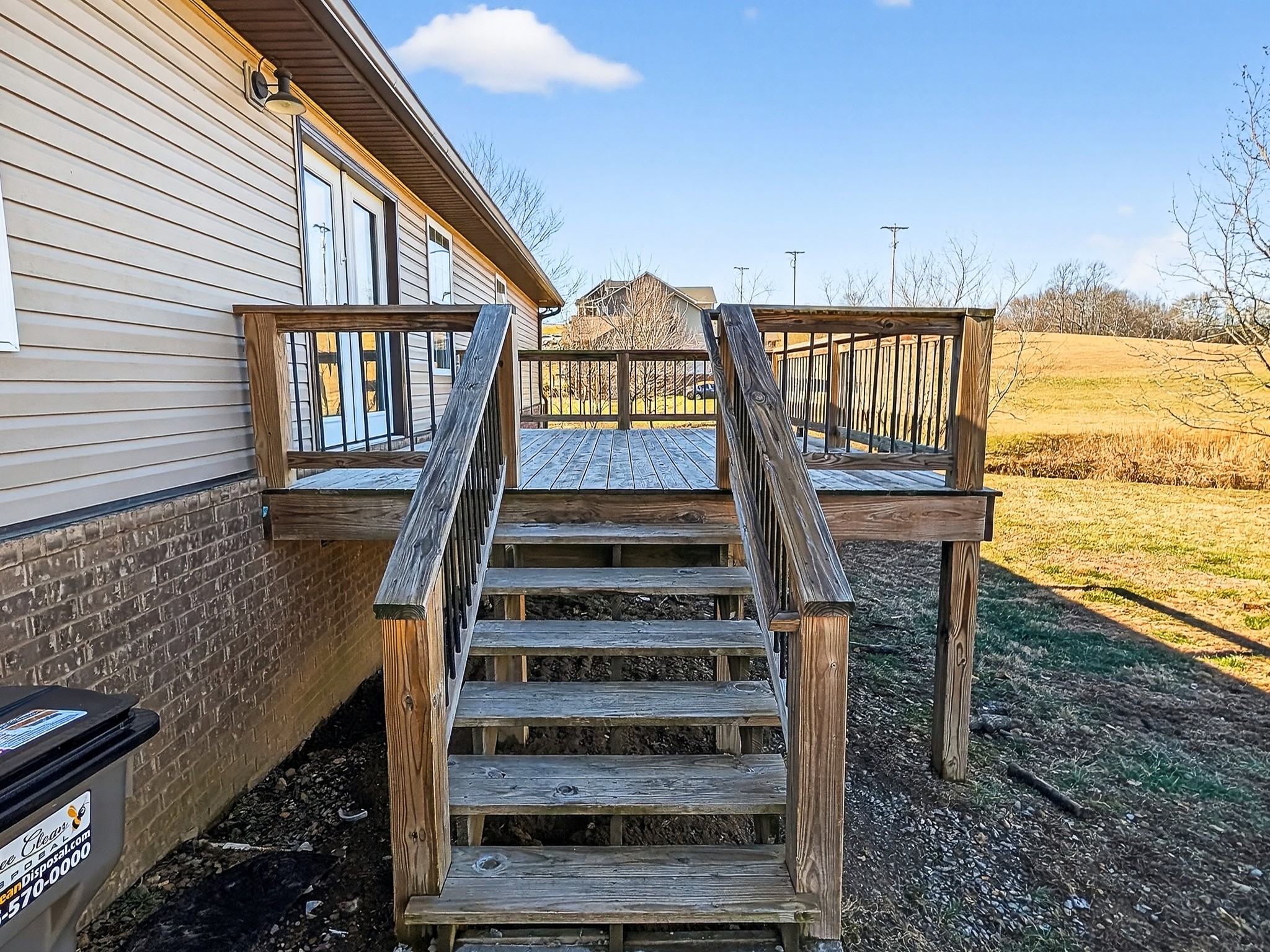 621 Womack Road Bethpage, TN 37022 - Photo 47 of 50 a view of a house with backyard and deck
