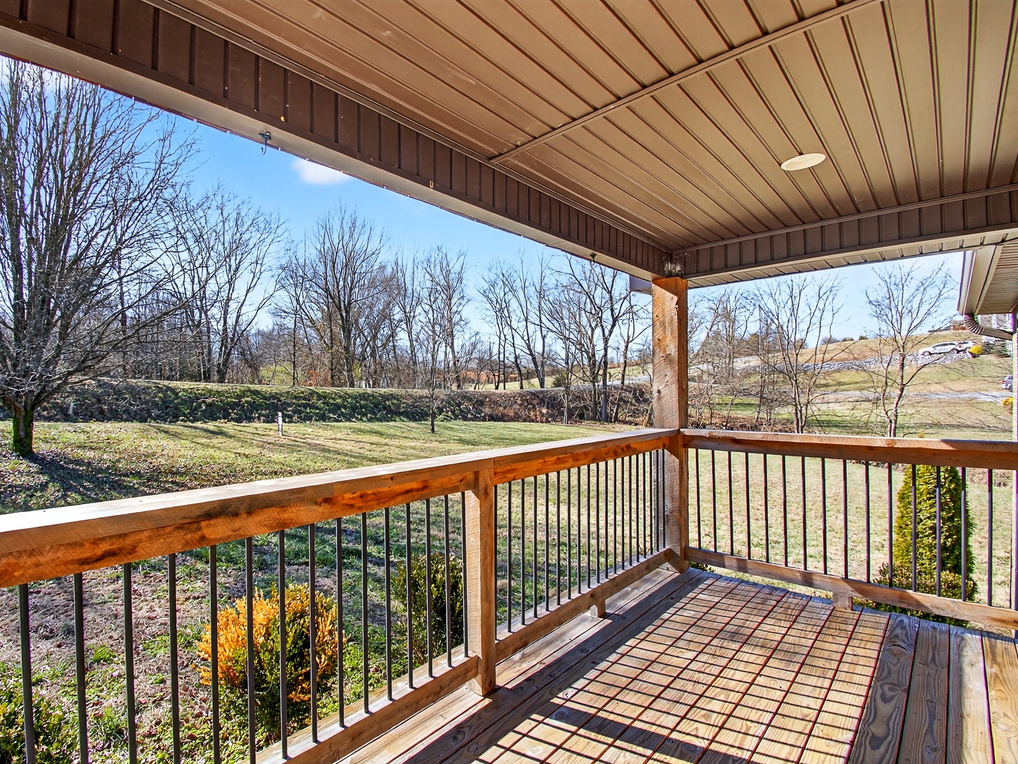 621 Womack Road Bethpage, TN 37022 - Photo 7 of 50 a view of balcony with wooden floor