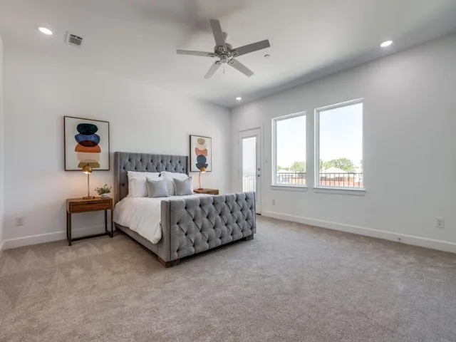 a bed room with a bed and a couch