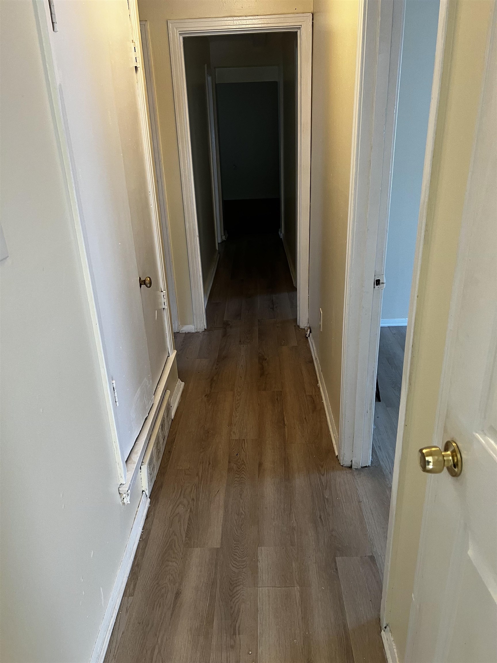 1336 James Street Memphis, TN 38106 - Photo 5 of 5 a view of a hallway with wooden floor and staircase