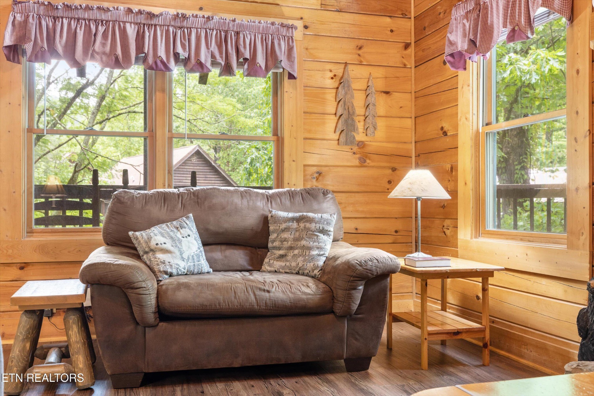 709 Grey Hawk Way Sevierville, TN 37863 - Photo 12 of 30 a living room with furniture and a window