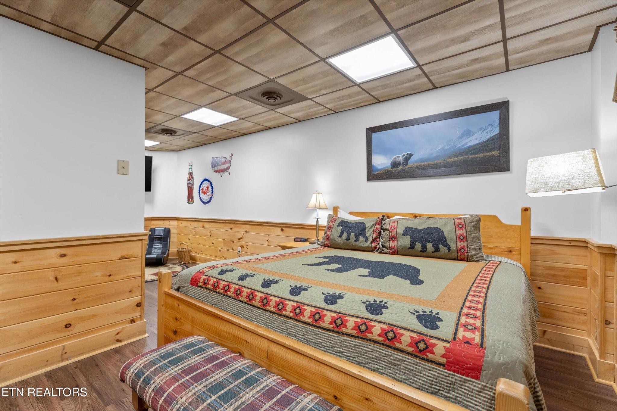 709 Grey Hawk Way Sevierville, TN 37863 - Photo 22 of 30 a bed sitting in a room next to a lamp
