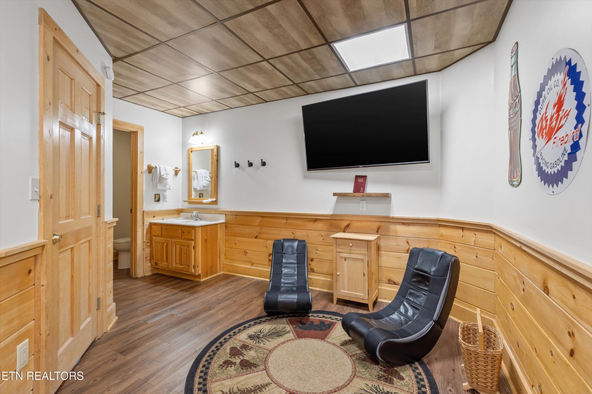 709 Grey Hawk Way Sevierville, TN 37863 - Photo 24 of 30 a living room with furniture and a flat screen tv