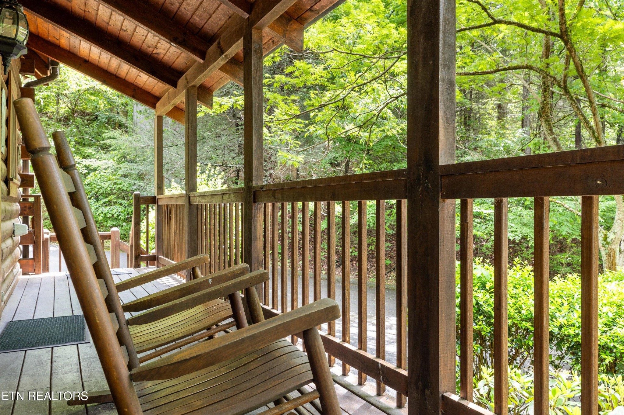 709 Grey Hawk Way Sevierville, TN 37863 - Photo 5 of 30 a view of a balcony with wooden floor