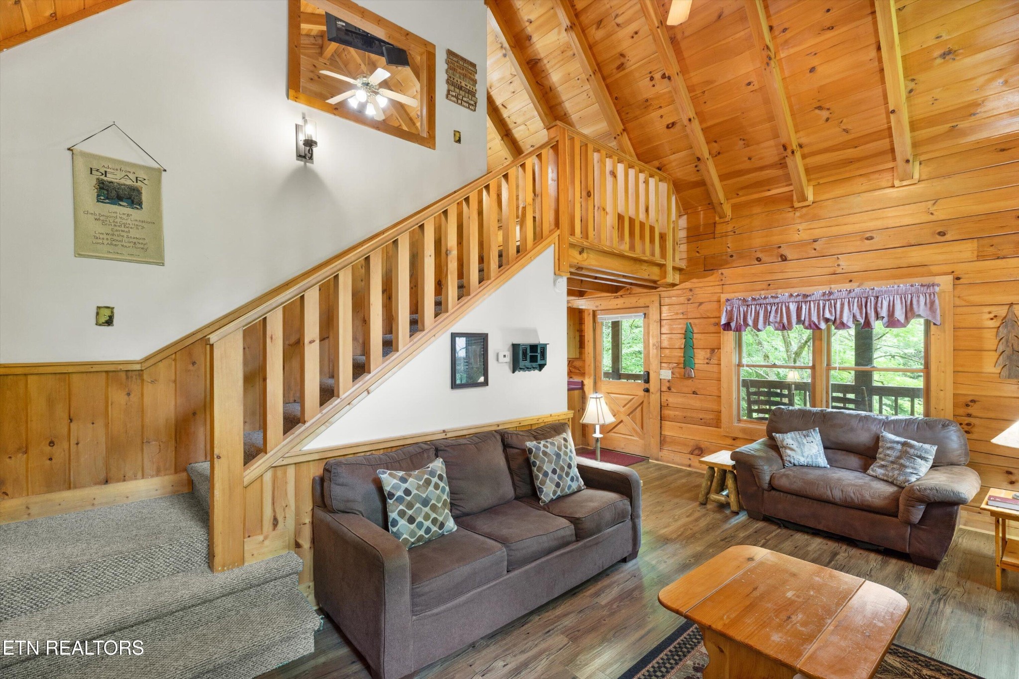 709 Grey Hawk Way Sevierville, TN 37863 - Photo 10 of 30 a living room with furniture and a large window