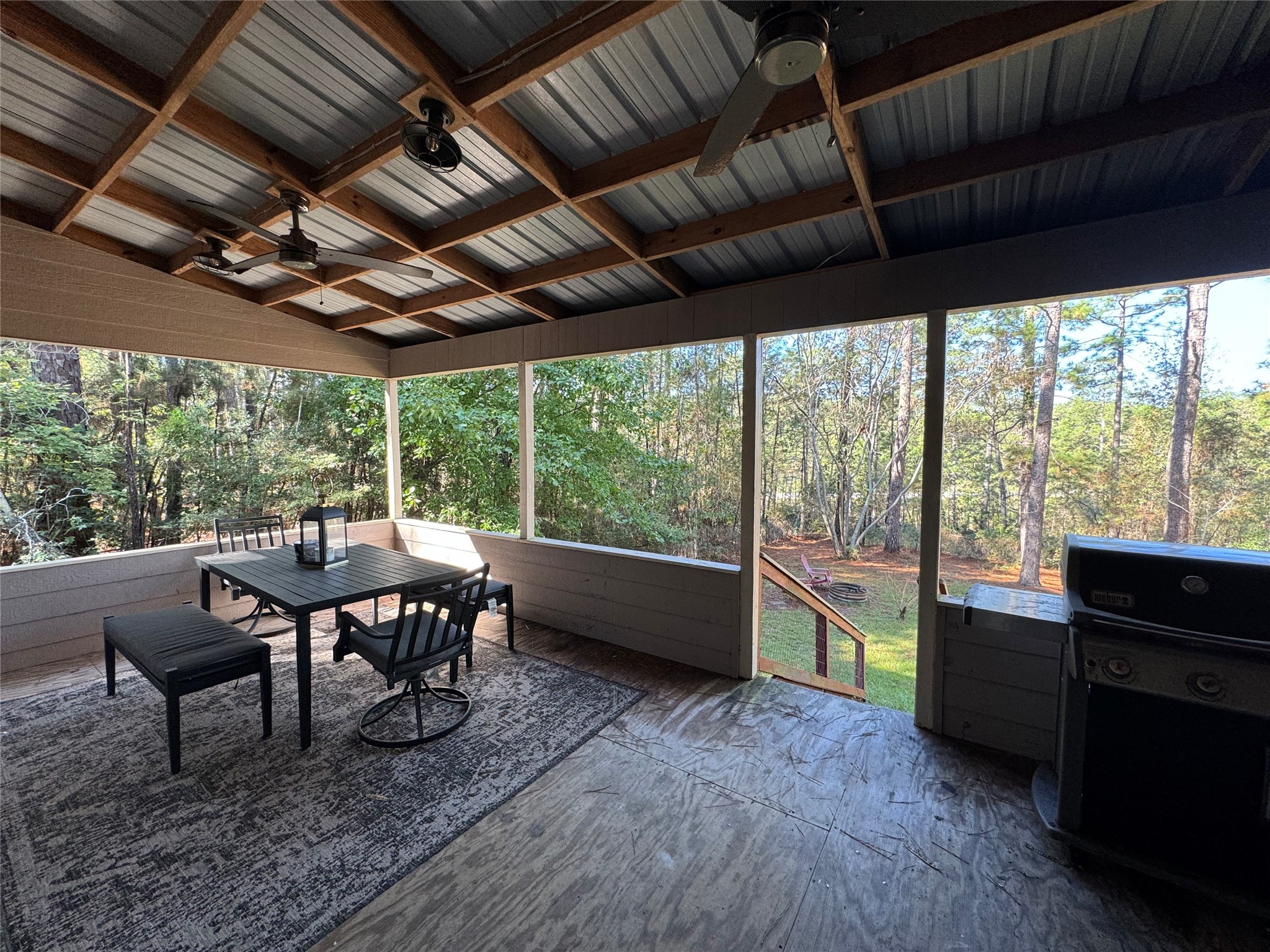 164 Pine Hollow Cove Brookeland, TX 75931 - Photo 12 of 38 a outdoor space with chairs