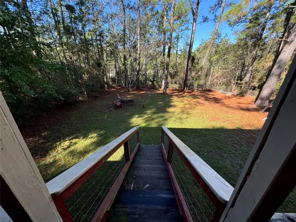 a view of swimming pool from a balcony