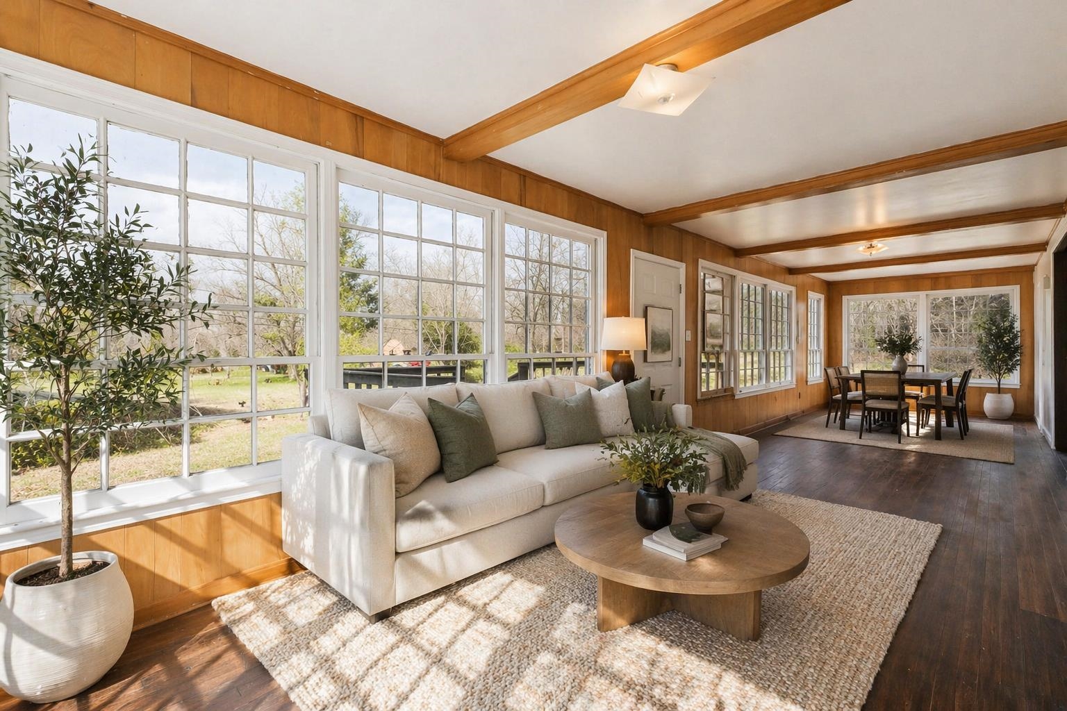 8457 East Kerrville Rosemark Road Millington, TN 38053 - Photo 10 of 32 Sunroom / solarium featuring beam ceiling, wooden walls, and wood finished floors