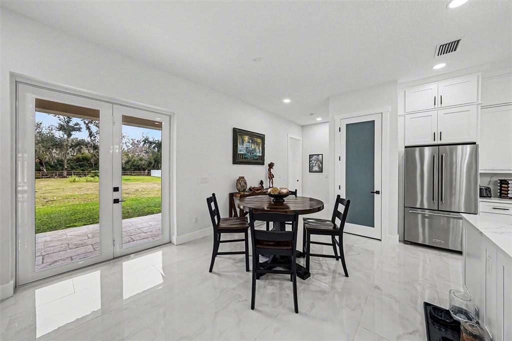 14060 Sydney Road Dover, FL 33527 - Photo 25 of 49 a view of a dining room with furniture window and outside view