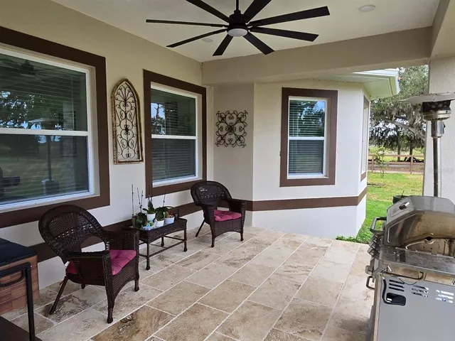 a living room with furniture and a window