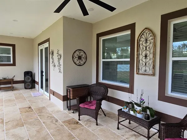 a living room with furniture and window