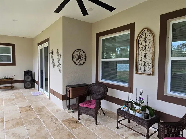 a living room with furniture and window
