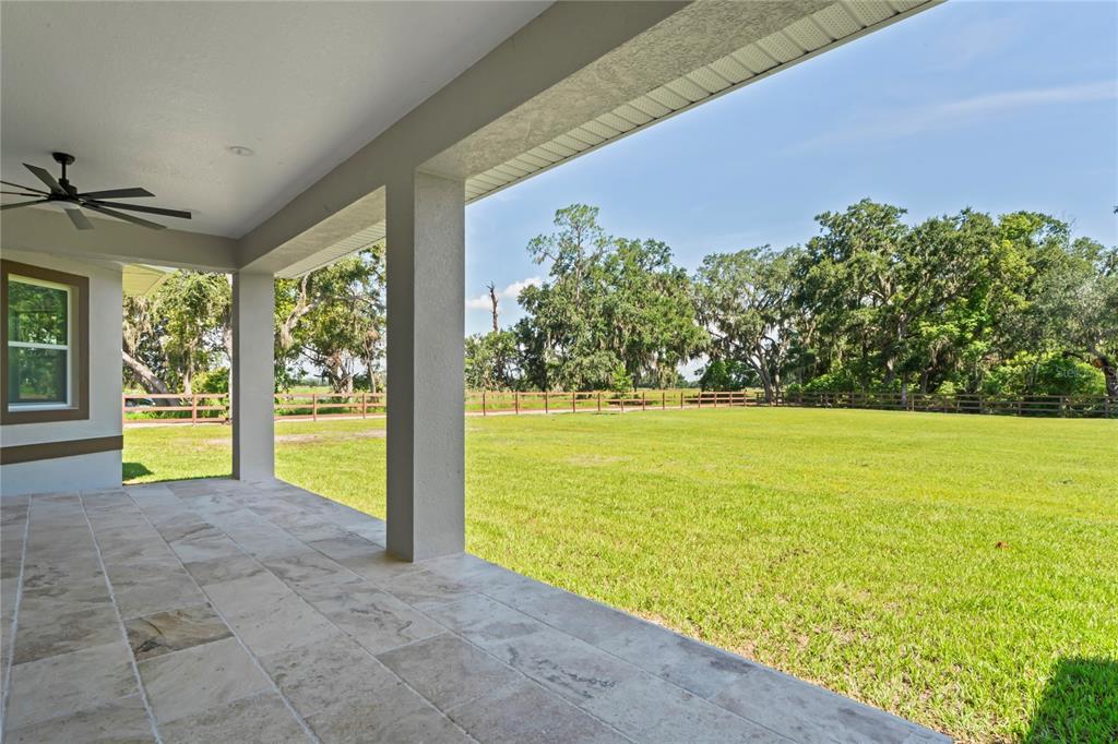 14060 Sydney Road Dover, FL 33527 - Photo 39 of 49 a view of swimming pool with an outdoor space and seating area
