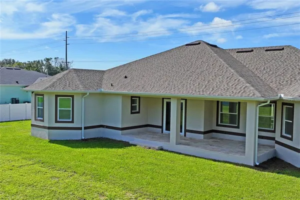 a view of a house with a garden