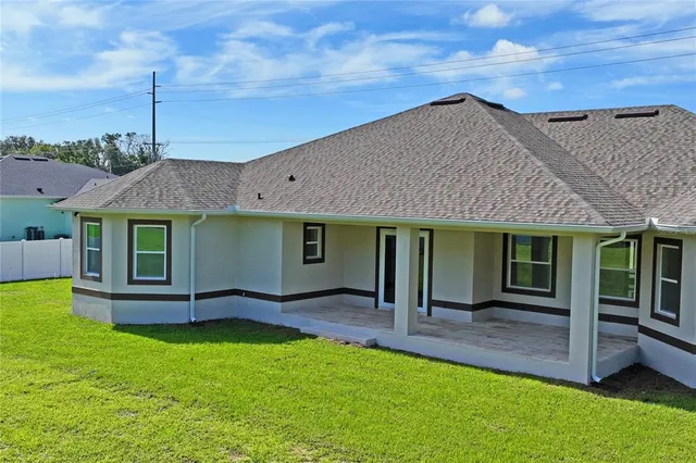 a view of a house with a garden