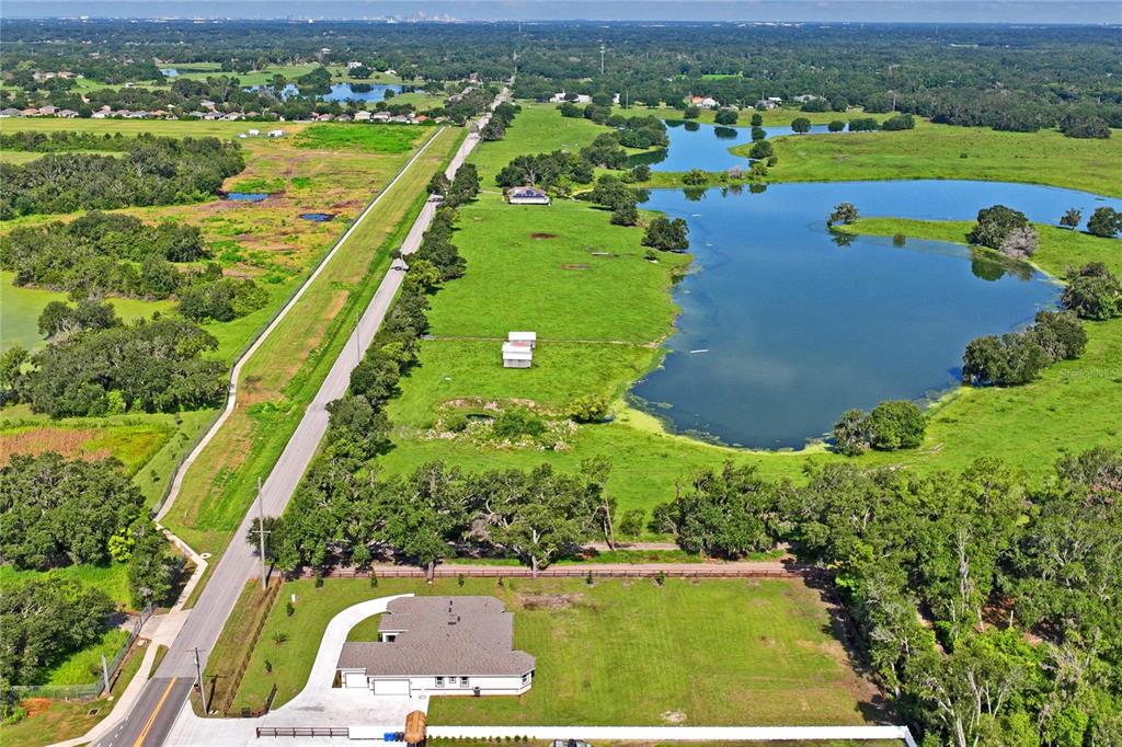 14060 Sydney Road Dover, FL 33527 - Photo 49 of 49 an aerial view of swimming pool with a yard