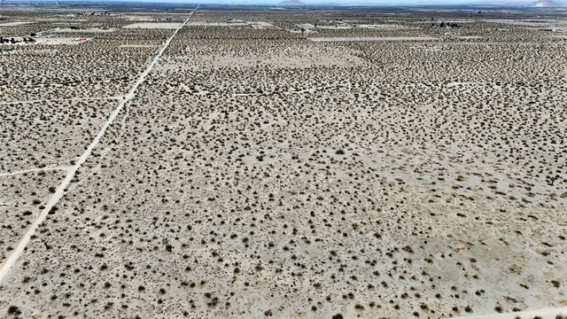 view of a black and white floor to a window