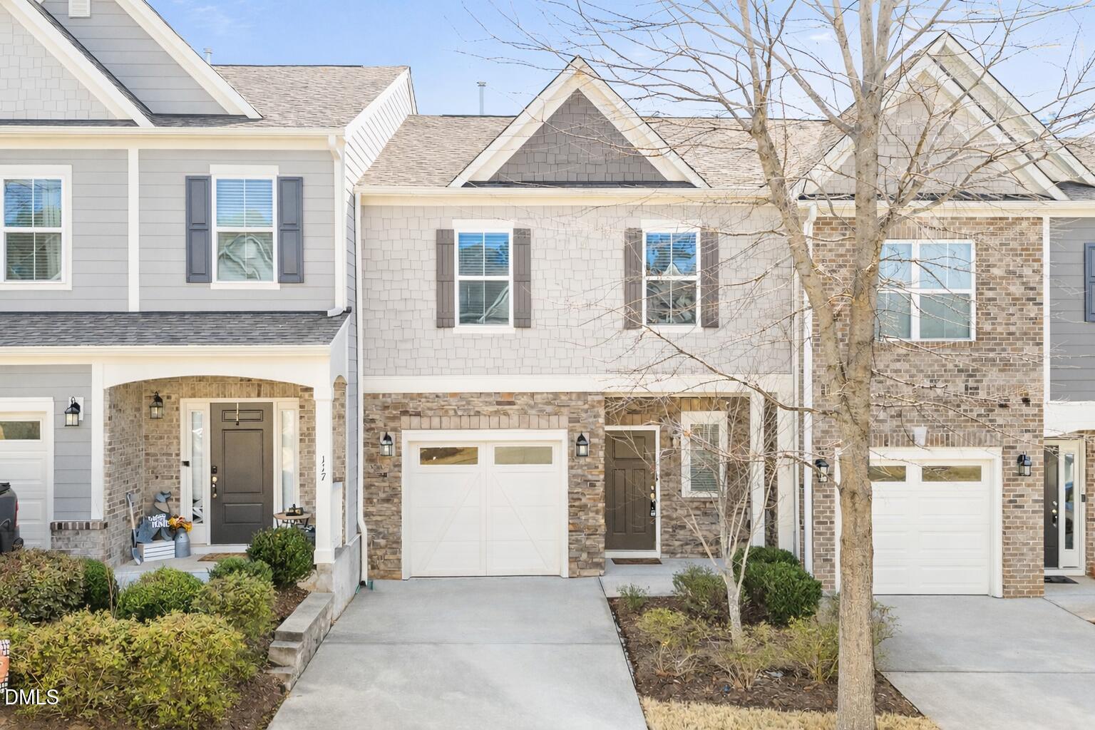 115 Writing Rock Place Apex, NC 27539 - Photo 1 of 31 front view of a house with a yard