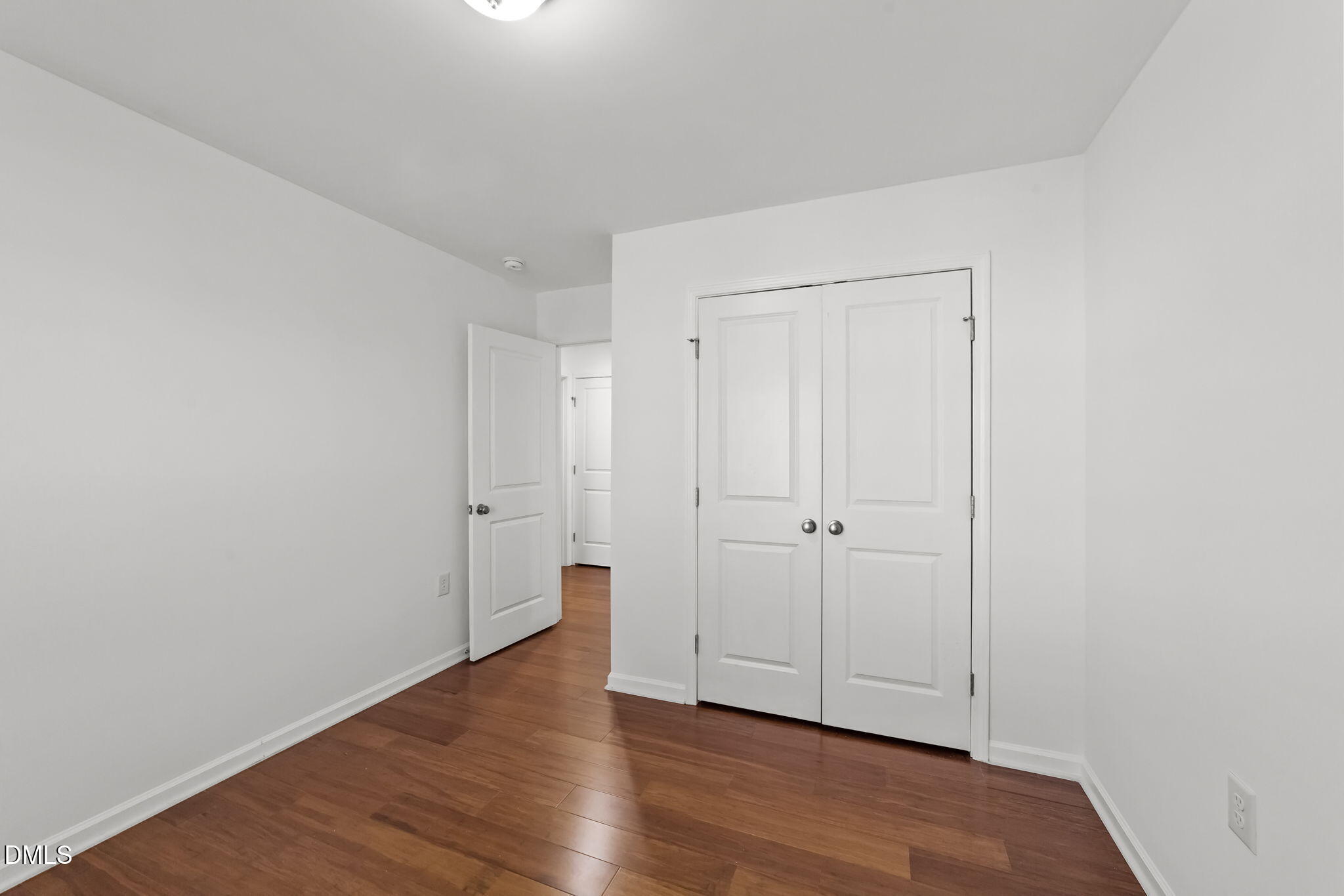 115 Writing Rock Place Apex, NC 27539 - Photo 22 of 31 a view of room with hardwood floor