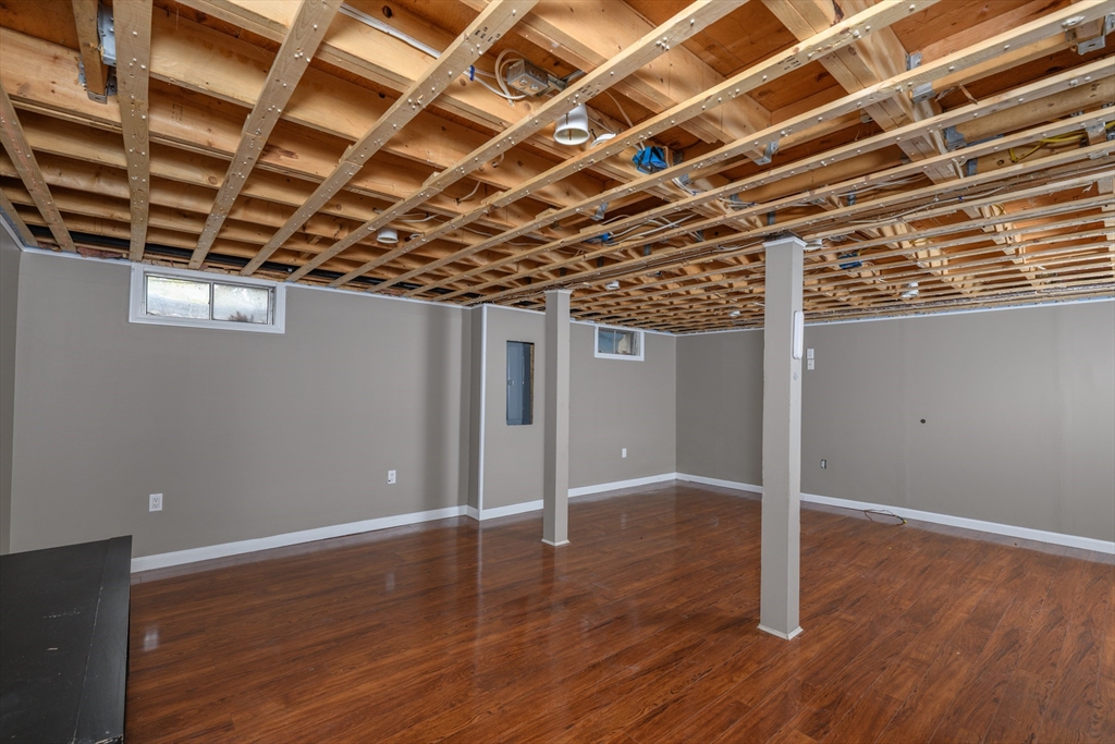 9 Sczygiel Road Ware, MA 01082 - Photo 20 of 29 a view of an empty room with wooden floor