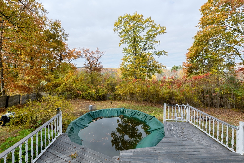 9 Sczygiel Road Ware, MA 01082 - Photo 7 of 29 a view of a balcony with wooden fence