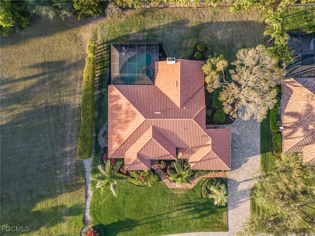 15661 Fiddlesticks Boulevard Fort Myers, FL 33912 - Photo 38 of 42 an aerial view of a house with a lake view