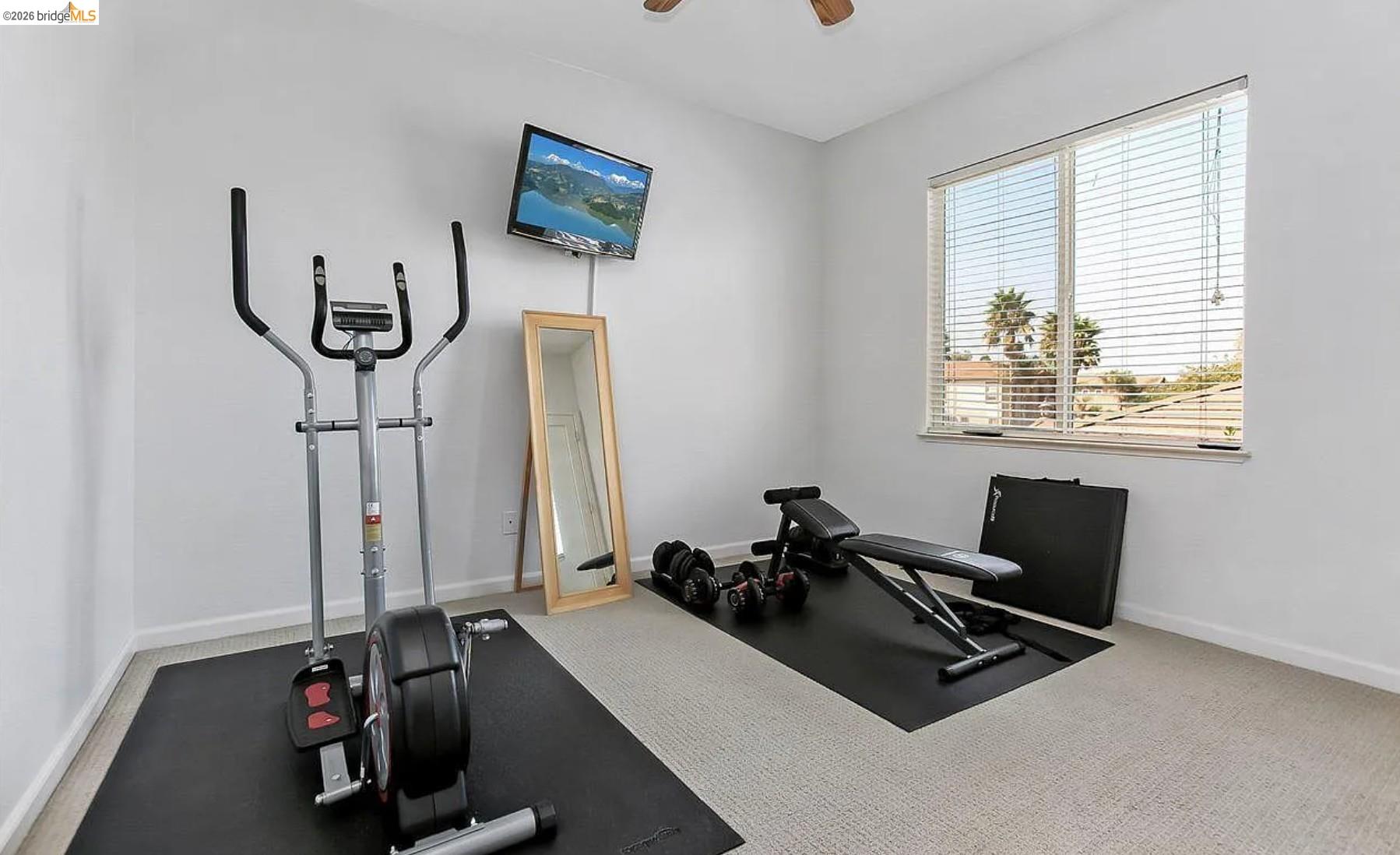 3251 Lookout Point Loop Discovery Bay, CA 94505 - Photo 18 of 31 Workout area featuring carpet and ceiling fan