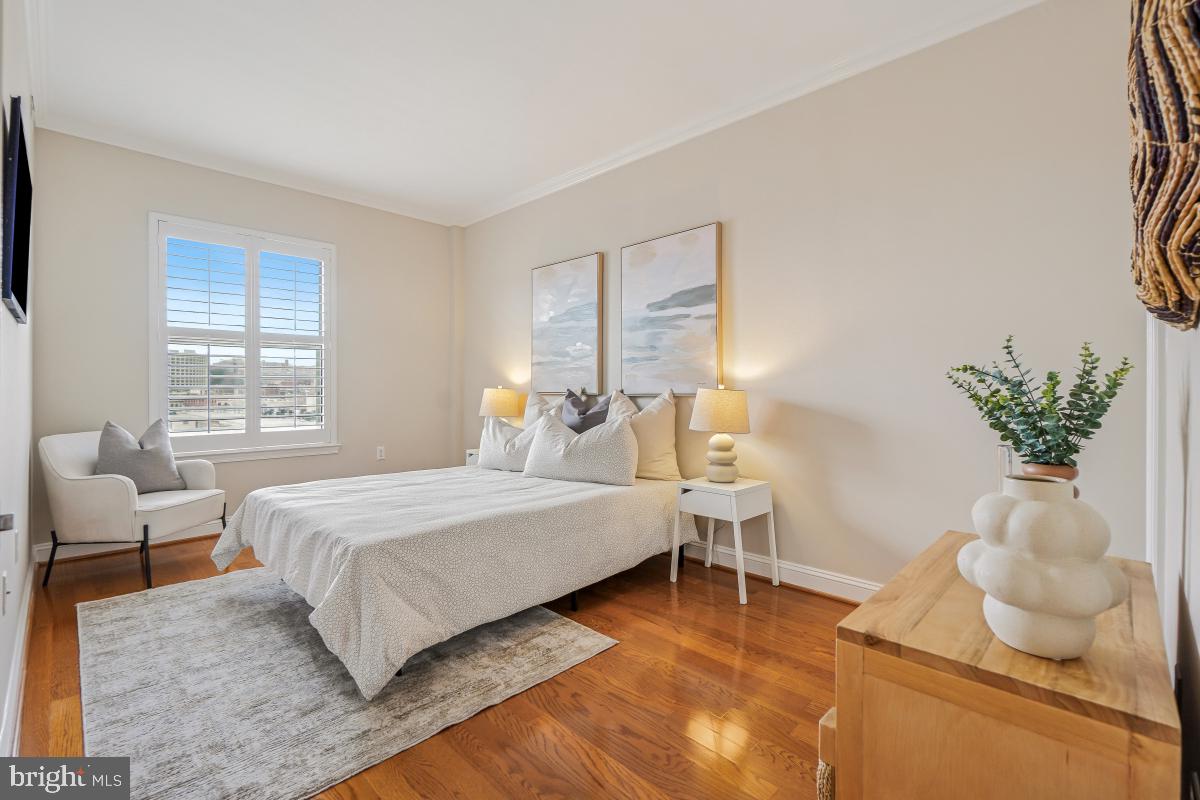1621 T Street Northwest, Unit PH02 Washington, DC 20009 - Photo 16 of 30 a bedroom with a bed and window