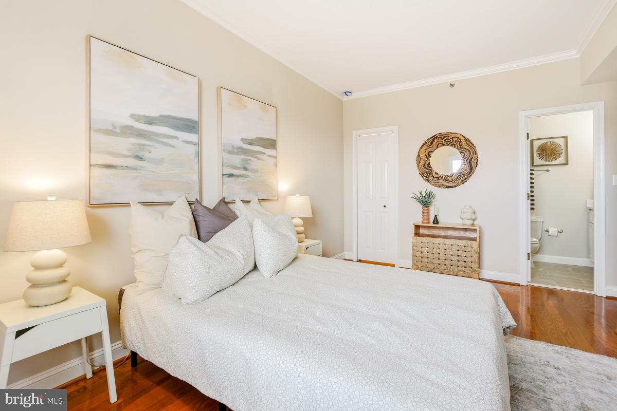 1621 T Street Northwest, Unit PH02 Washington, DC 20009 - Photo 17 of 30 a bedroom with a bed and a lamp