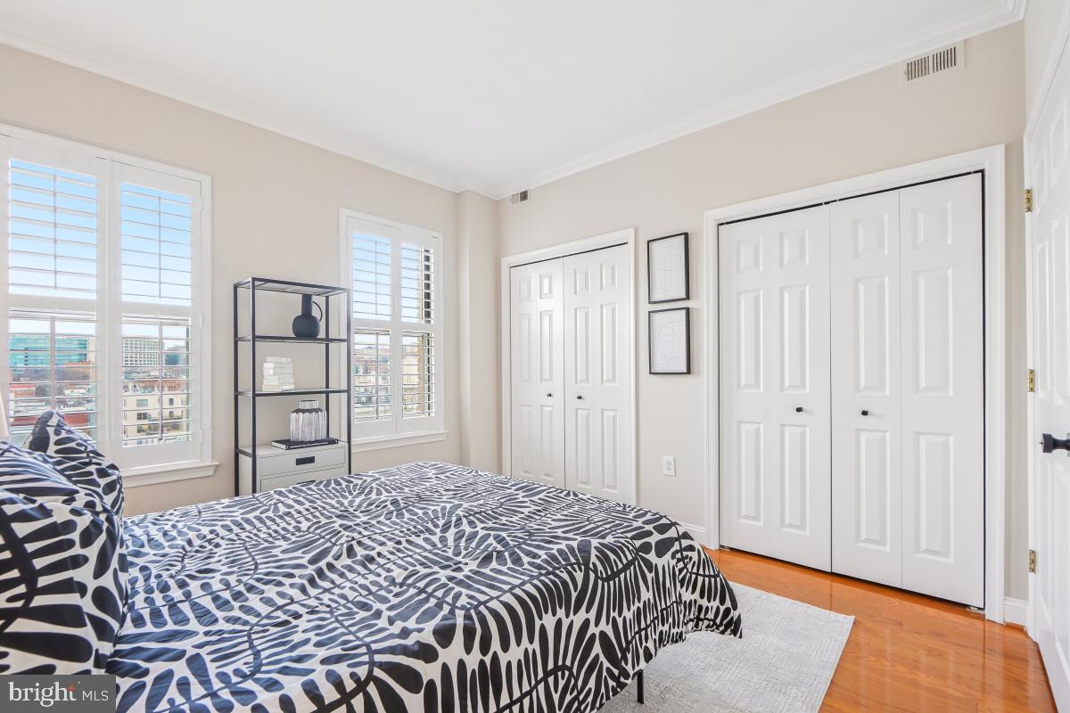 1621 T Street Northwest, Unit PH02 Washington, DC 20009 - Photo 23 of 30 a bedroom with a large bed and a window