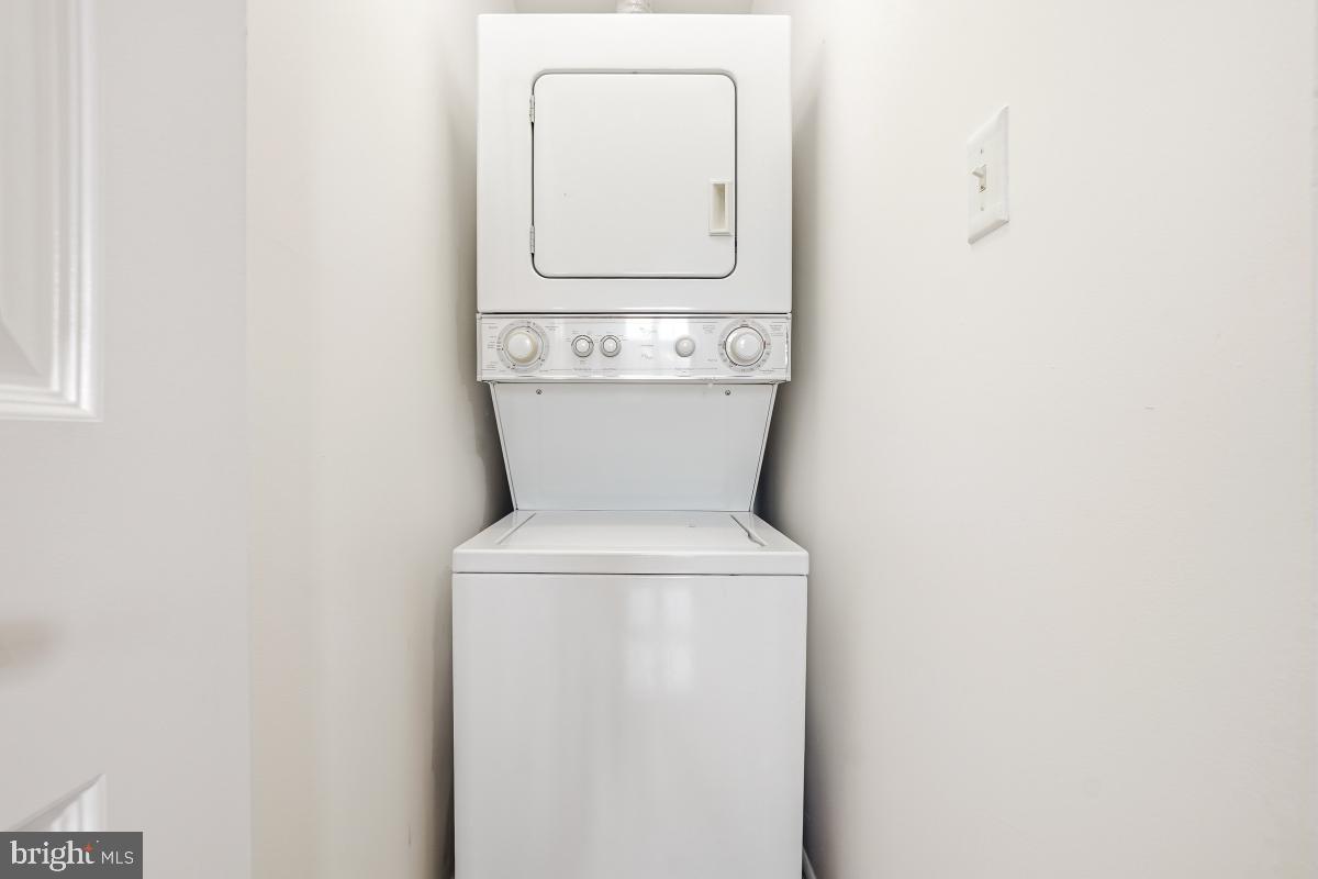 1621 T Street Northwest, Unit PH02 Washington, DC 20009 - Photo 28 of 30 a close view of a utility room with dryer and washer