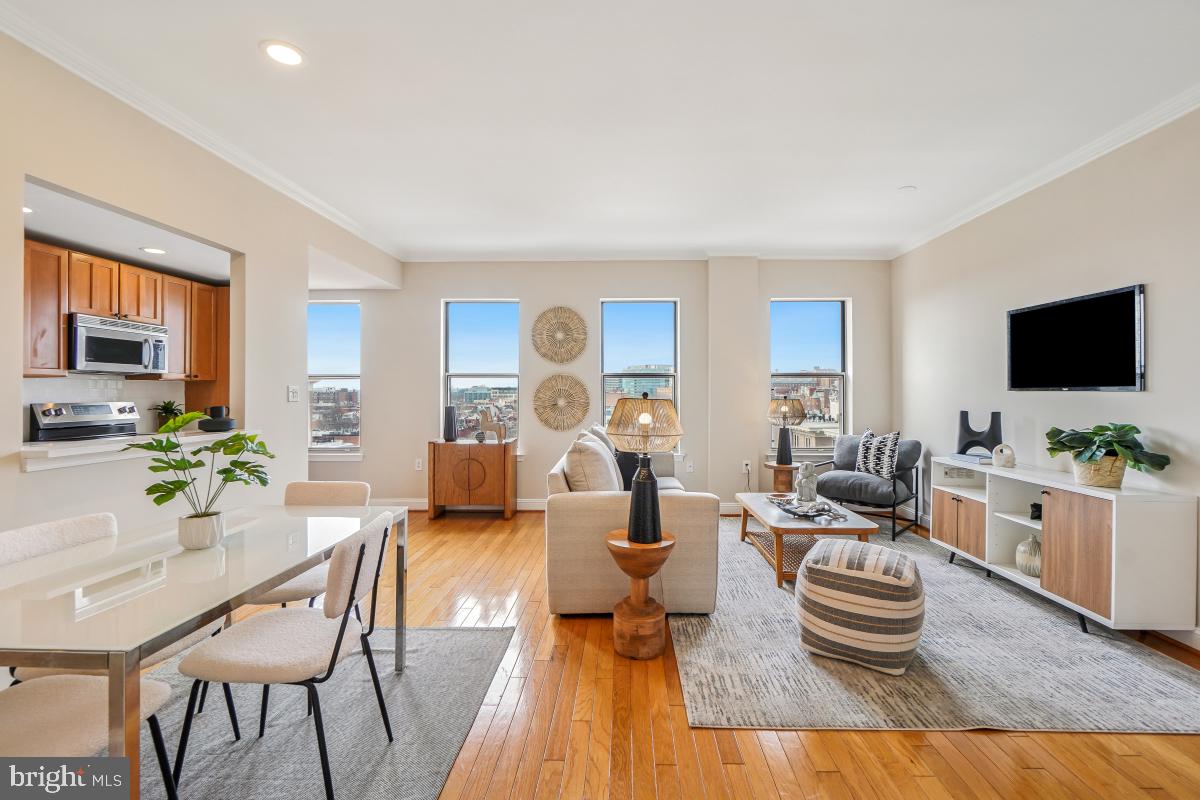 1621 T Street Northwest, Unit PH02 Washington, DC 20009 - Photo 4 of 30 a living room with furniture and a flat screen tv