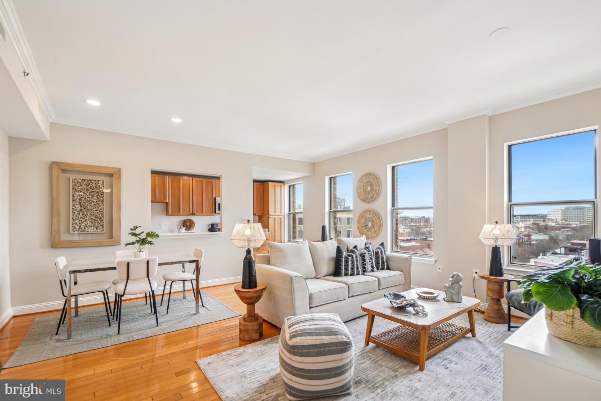 1621 T Street Northwest, Unit PH02 Washington, DC 20009 - Photo 5 of 30 a living room with furniture and a large window