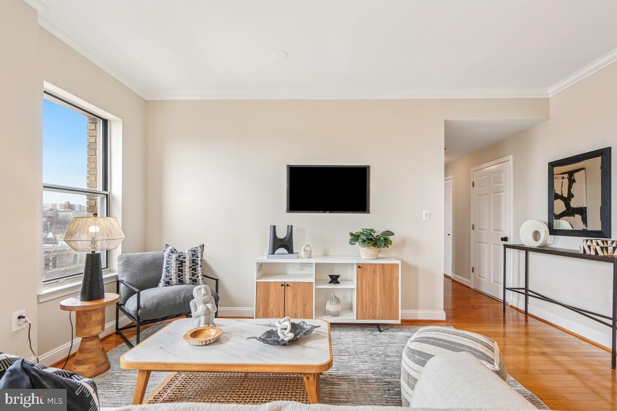 1621 T Street Northwest, Unit PH02 Washington, DC 20009 - Photo 7 of 30 a living room with furniture and a flat screen tv