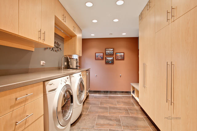 233 Perth Road Cary, IL 60013 - Photo 8 of 24 a view of a hallway with washer and dryer