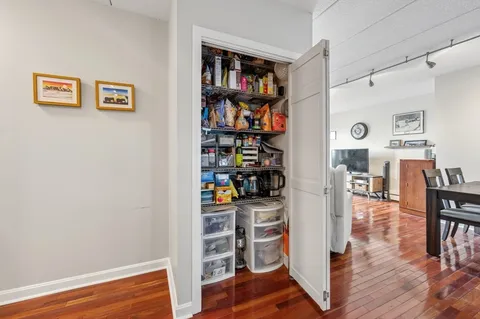 a view of a livingroom with furniture and wooden floor